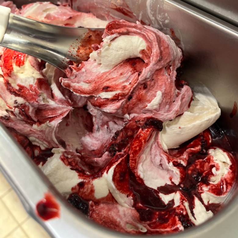 One pint of White Peach Raspberry Swirl gelato.